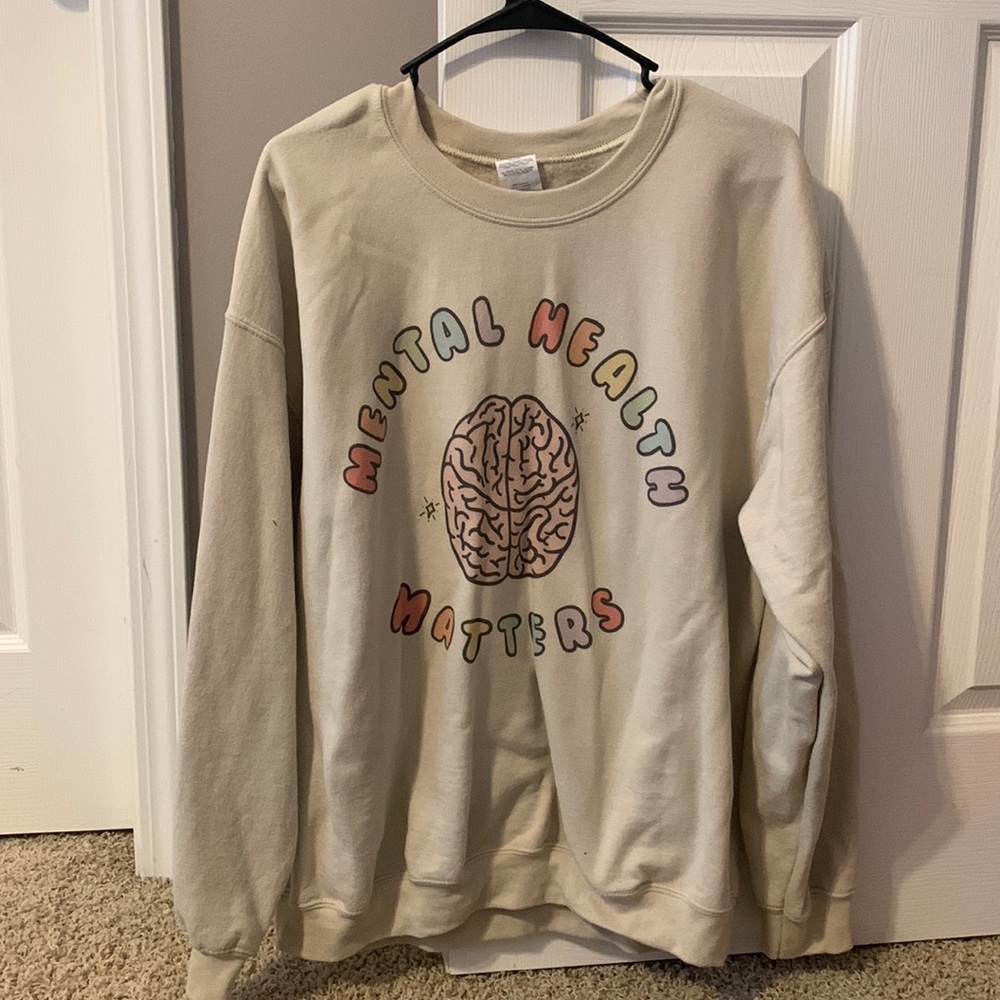 Large, tame crewneck sweater